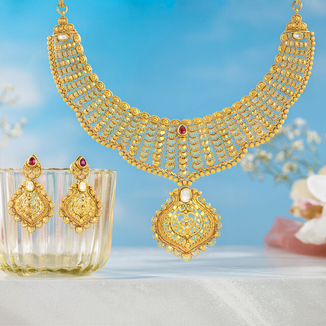 Buy Stunning Gold and Glass Kundan Necklace Set at Best Price