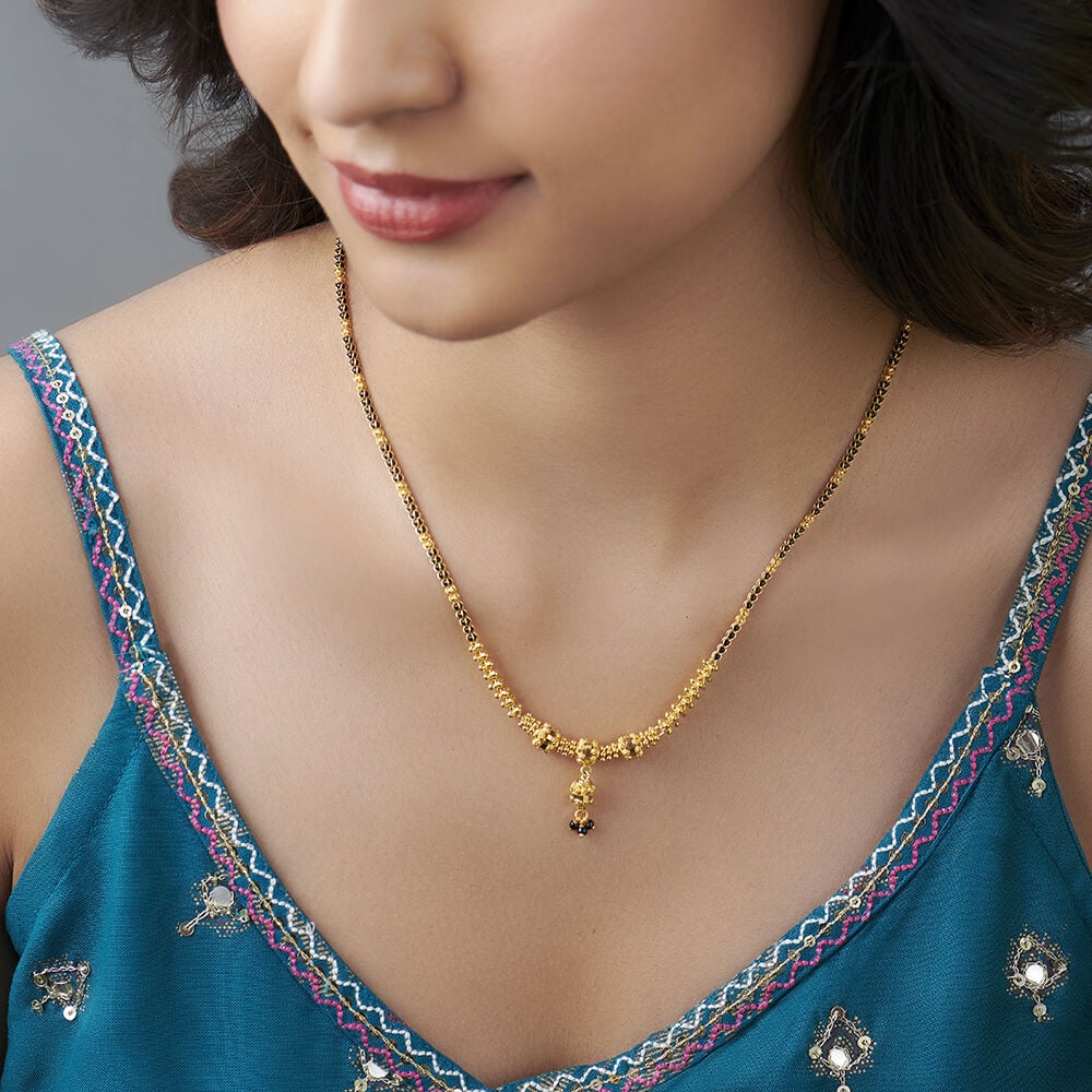 Gold black beads clearance chains tanishq
