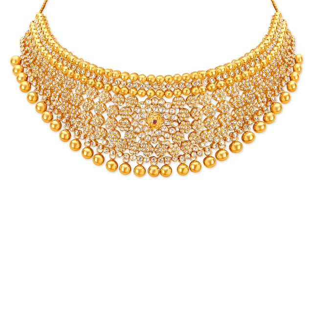 Glamourous Gold and Assorted Stones Necklace Set for the Telugu Bride