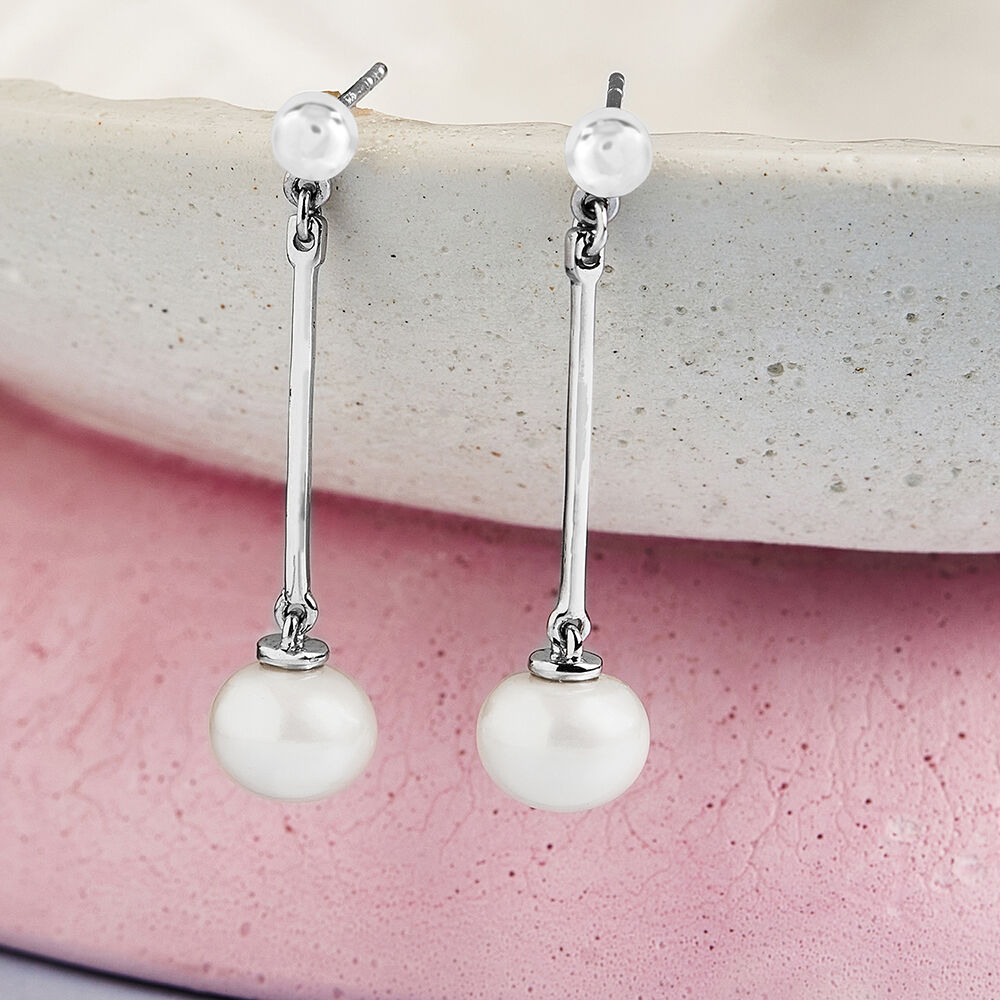 Pearl drop earrings tanishq top