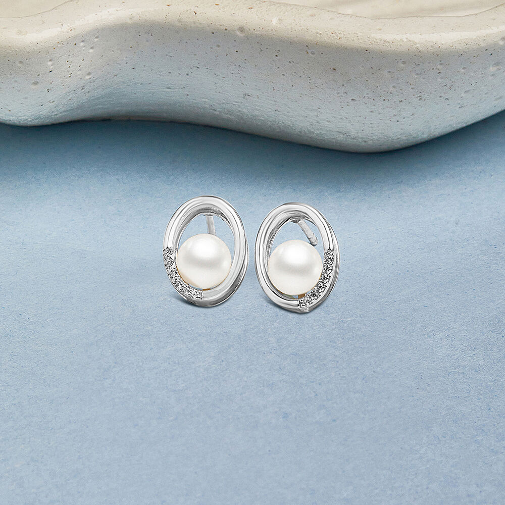 Pure silver earrings online tanishq deals
