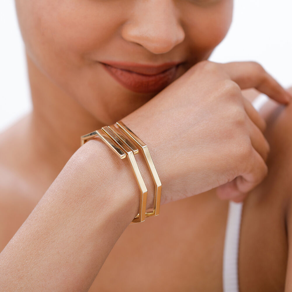 Spiral gold bangles best sale