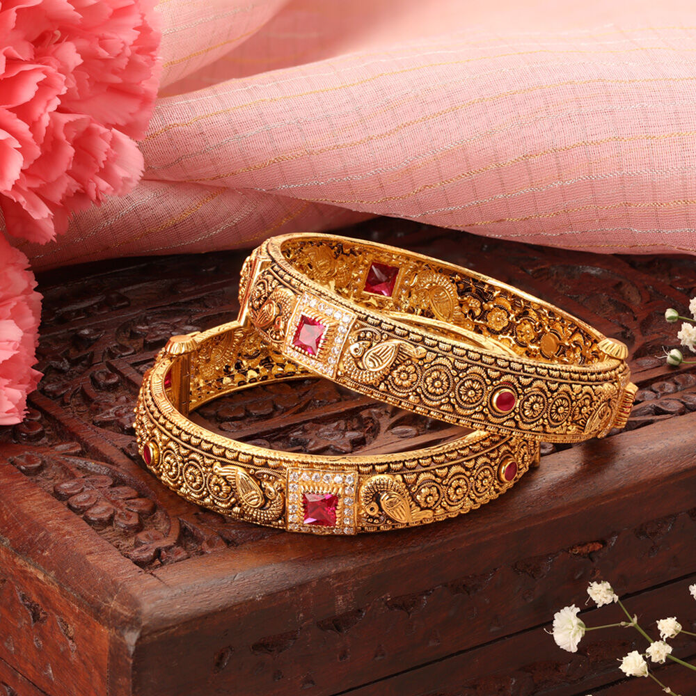Tanishq traditional shop gold bangles