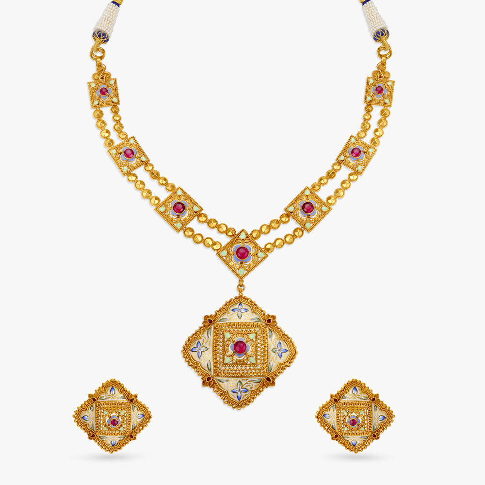 Gold necklace set designs tanishq hot sale
