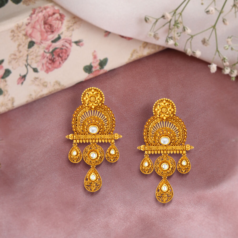 Antique gold earrings tanishq hot sale