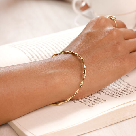 Twisted Radiant Gold Bangle