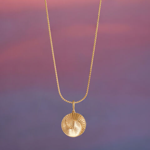 Radiant Sculpted Gold Pendant