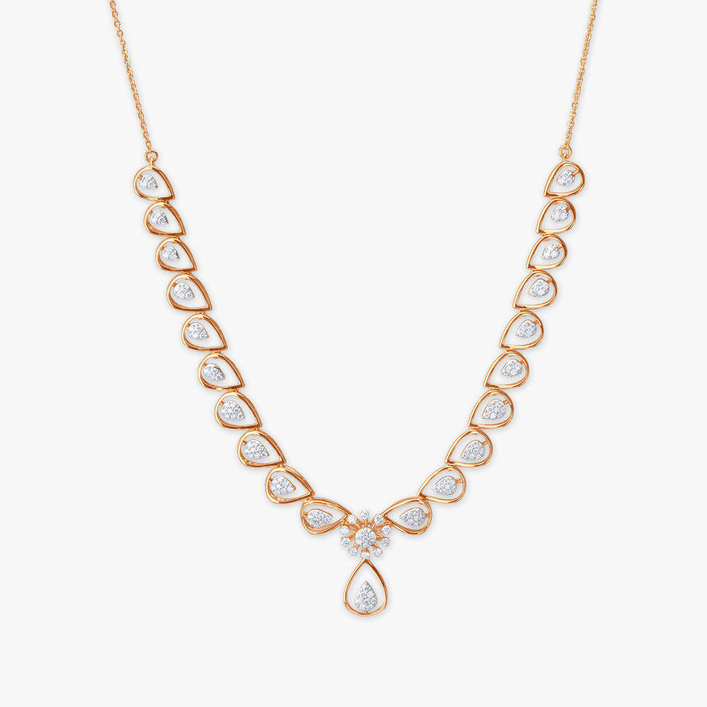 Diamond necklace set tanishq price sale