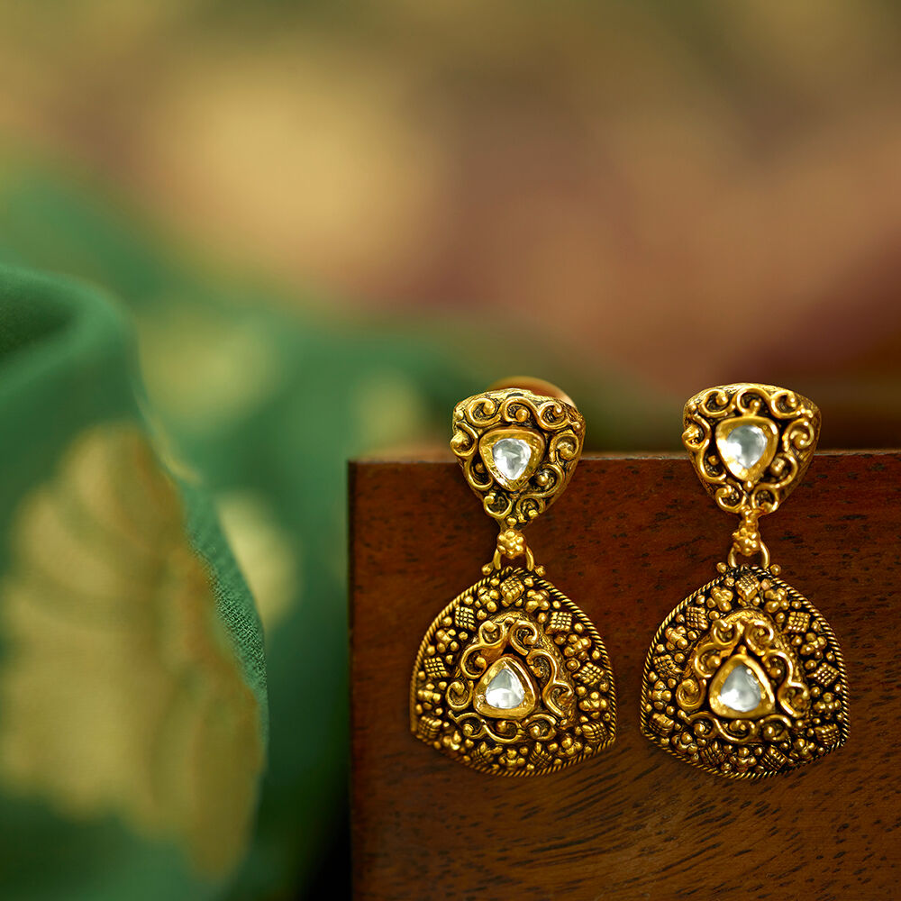 Kundan earrings tanishq deals
