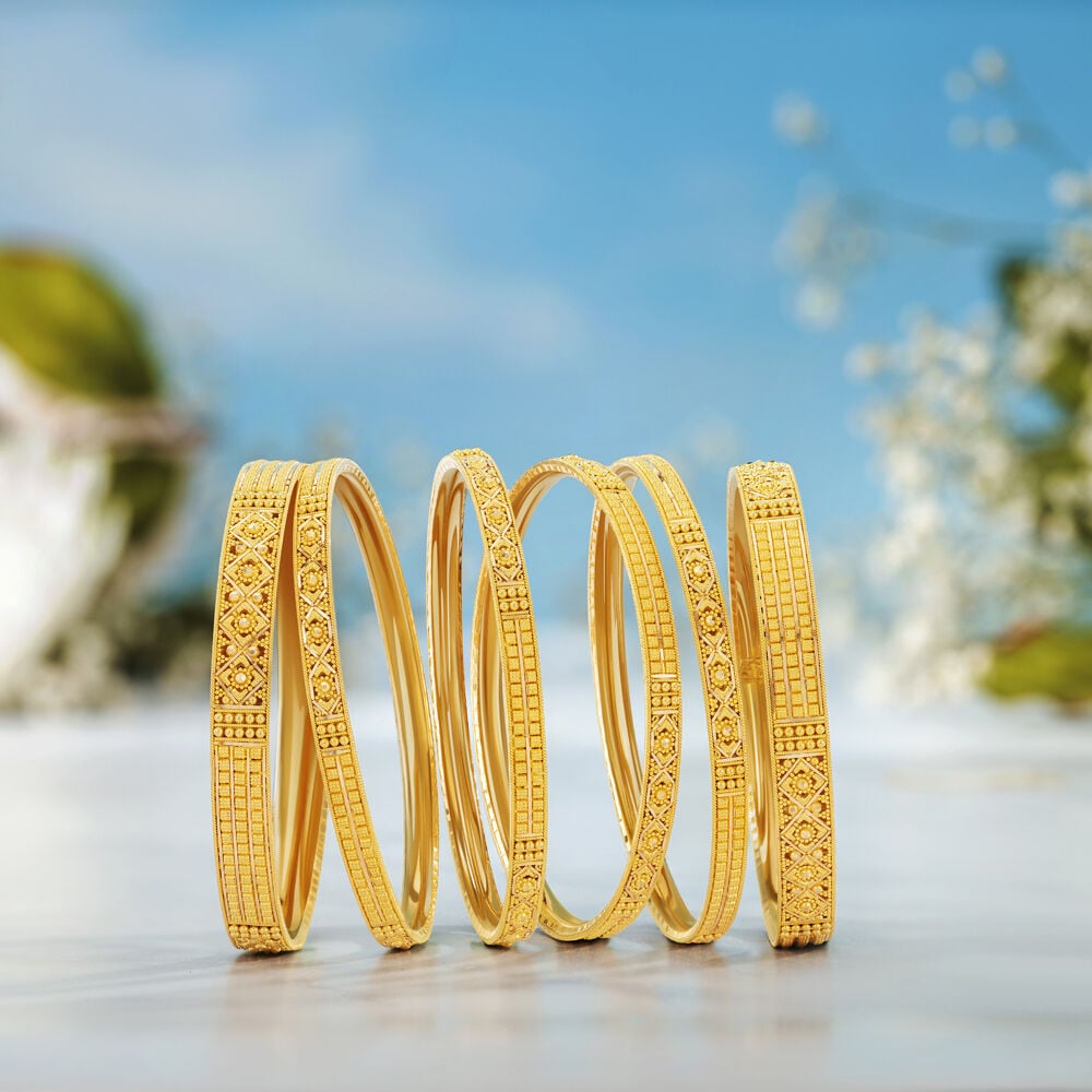 Gold bangle set tanishq top