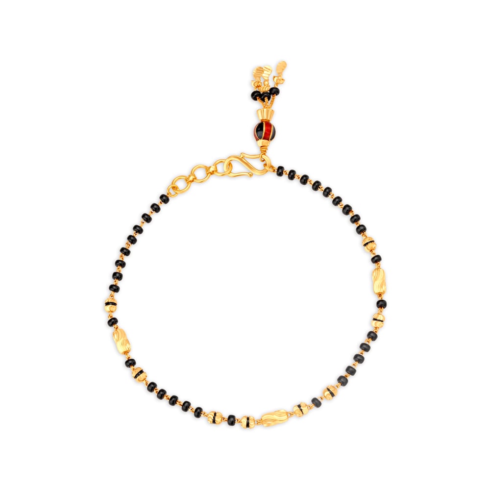 Gold mangalsutra on sale bracelet tanishq