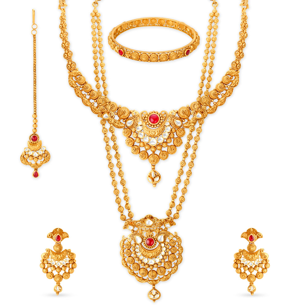 Ornate Gold Necklace Set with Haram, Maang Tikka and Bangle