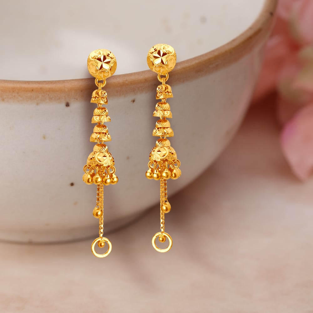 Gold Jhumka Earrings With Beads And Leave Motif