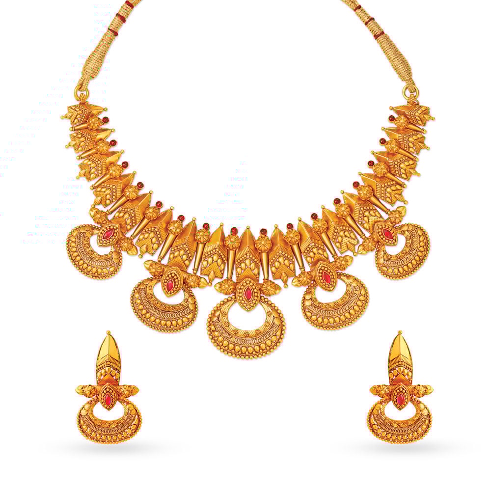 

Stone Studded Antique Gold Necklace Set