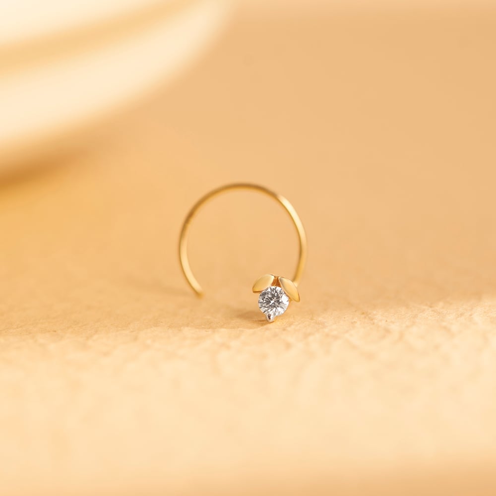 

Flowerbud Gold and Diamond Nose Pin