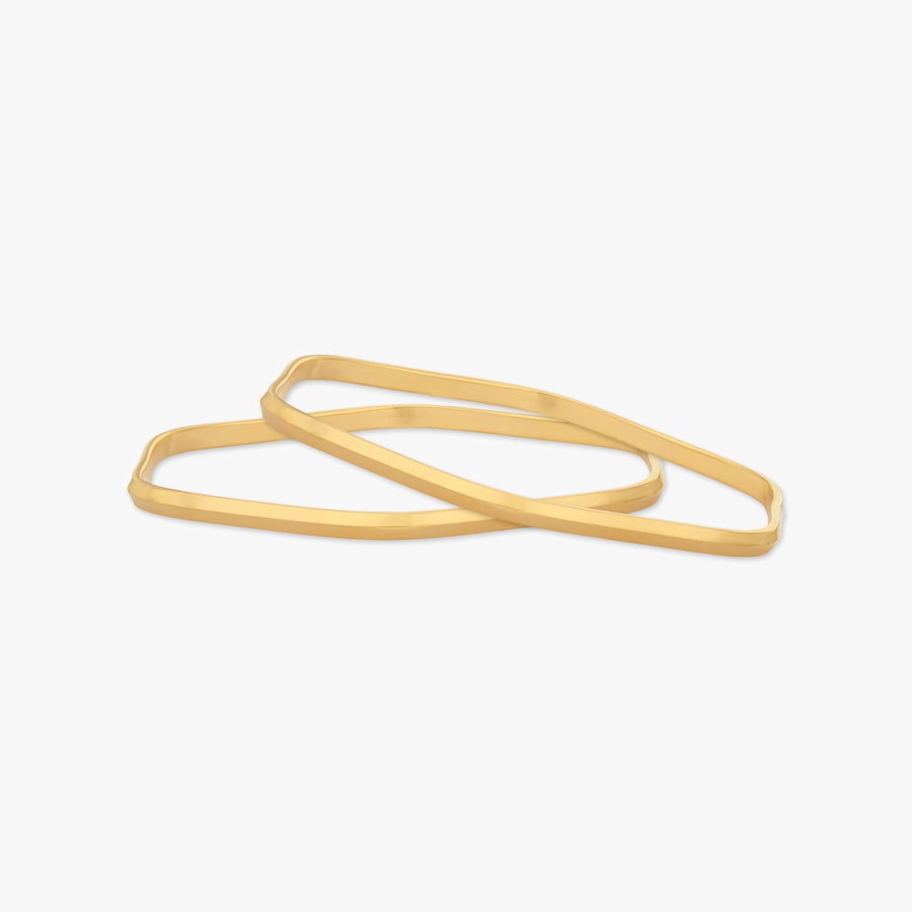 

Glint Geometry Gold Bangles