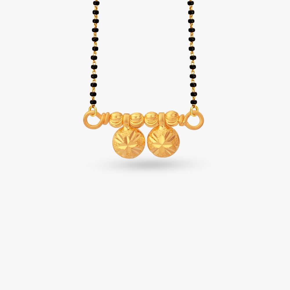 

Twin Sunburst Gold Pendant