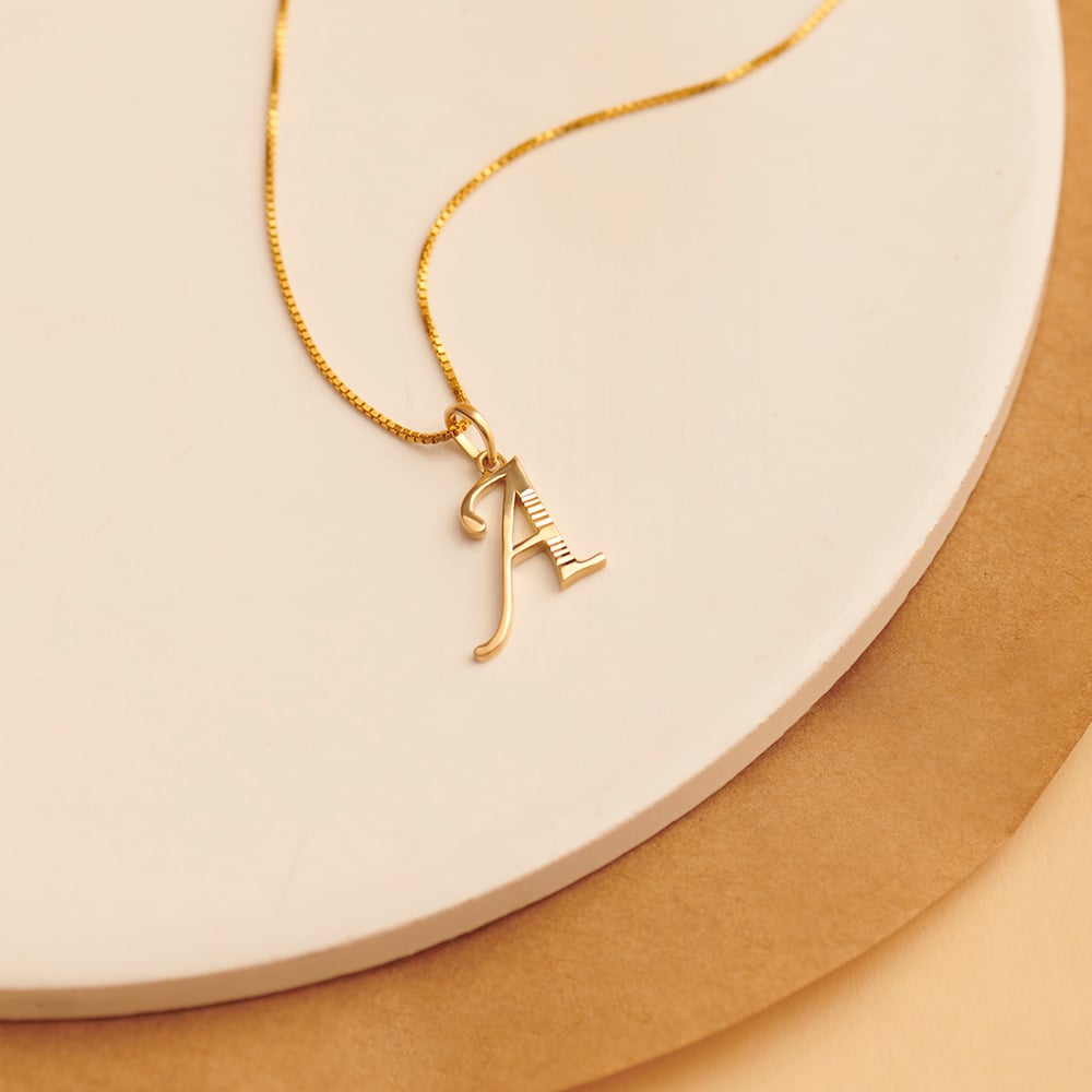 

A Letter Glossy Gold Pendant