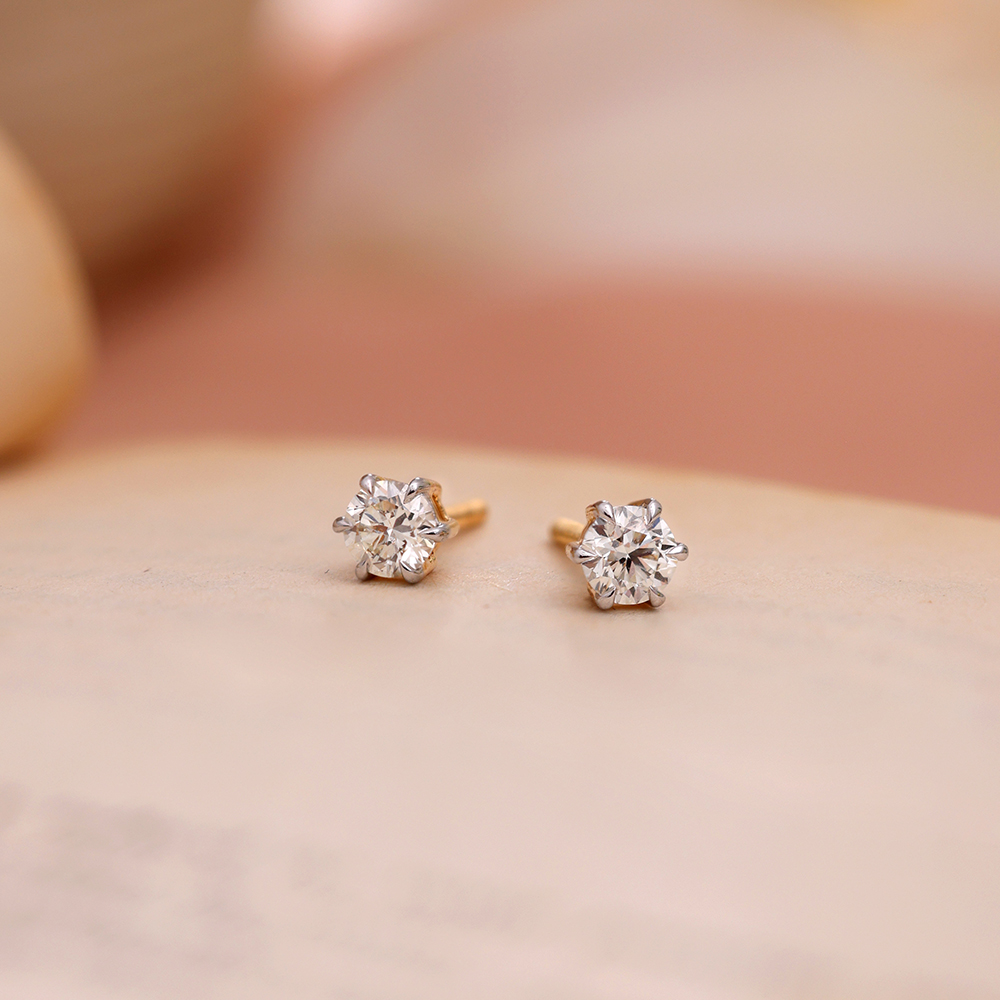 Small shop solitaire earrings
