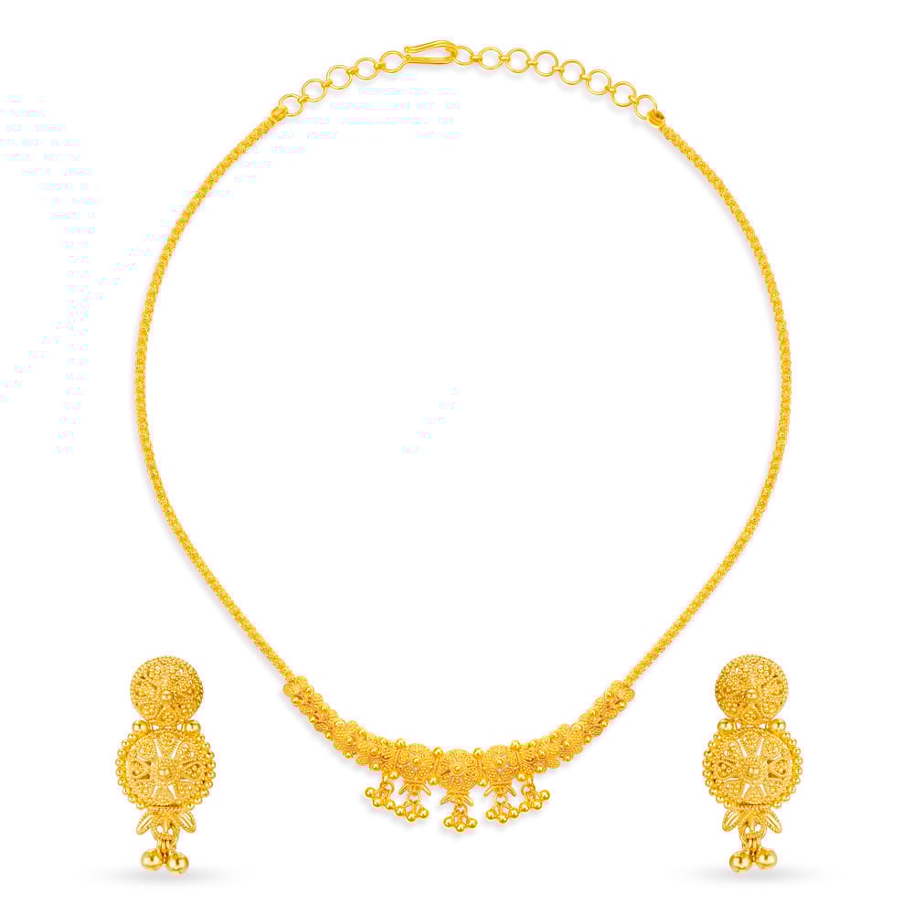 

Lavish Yellow Gold Beaded Necklace and Earrings Set