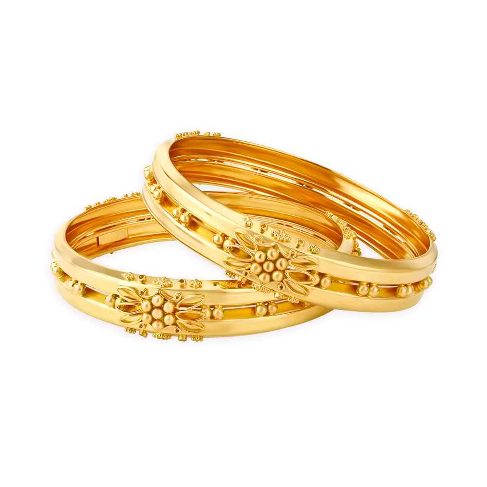

Floral Gold Bangles