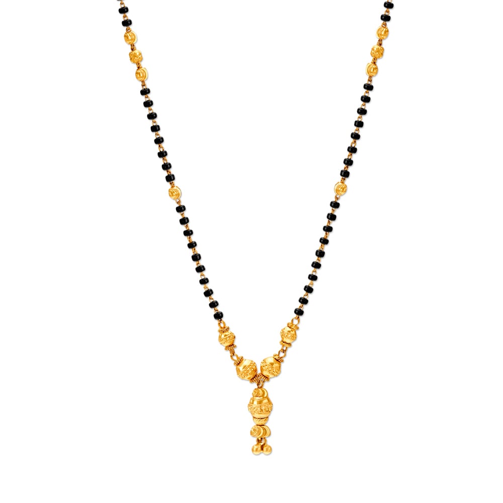 

Enticing Yellow Gold Carved Bead Mangalsutra