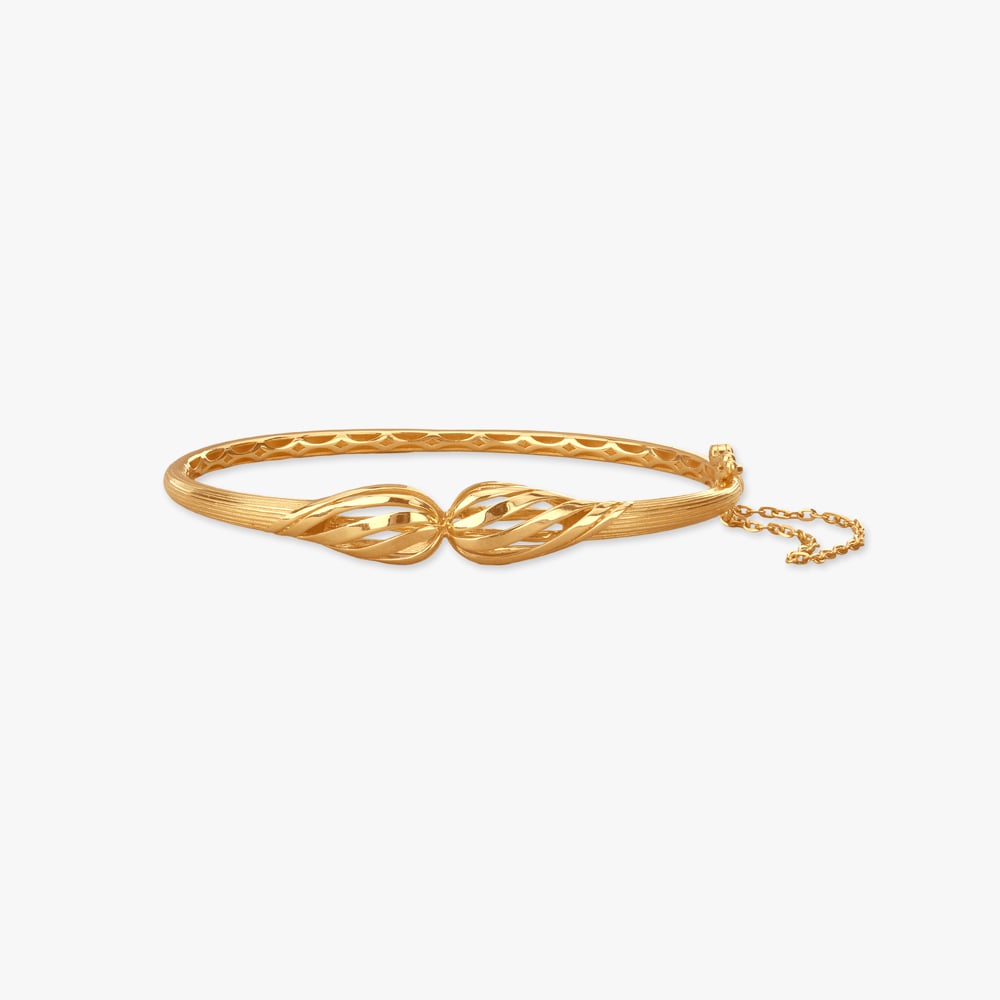 

Twisted Flow Gold Bangle