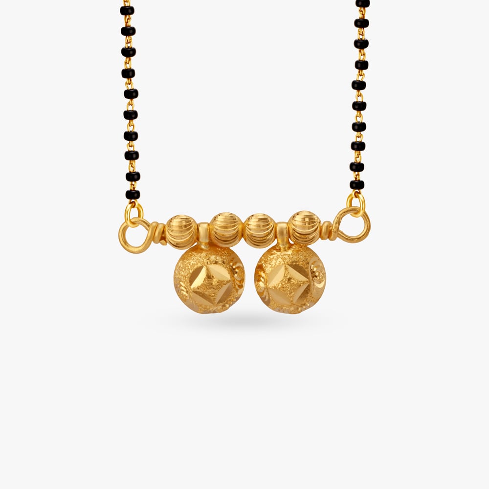 

Sacred Glow Thali Gold Pendant