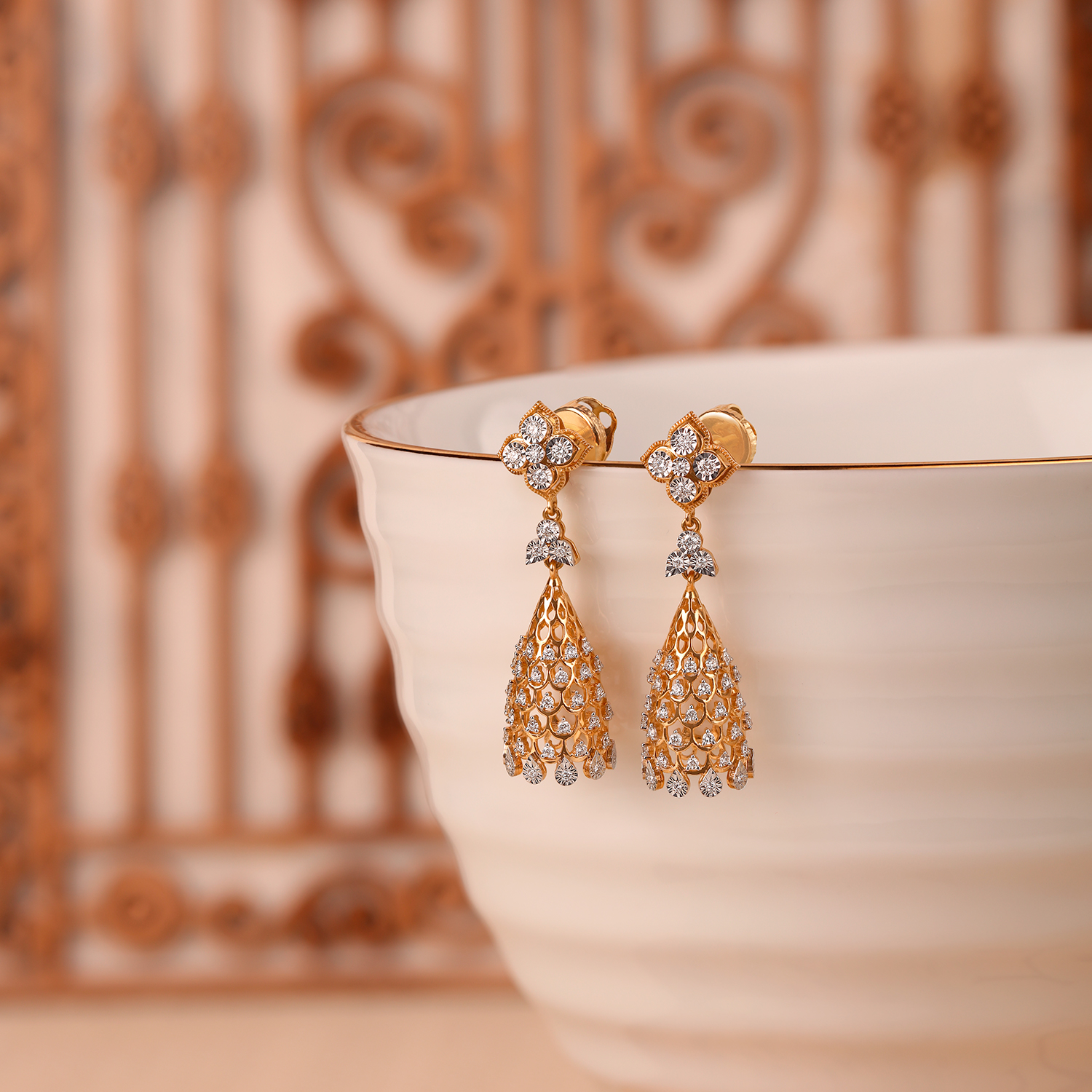 Magnificent Floral Gold and Diamond Studded Jhumkas