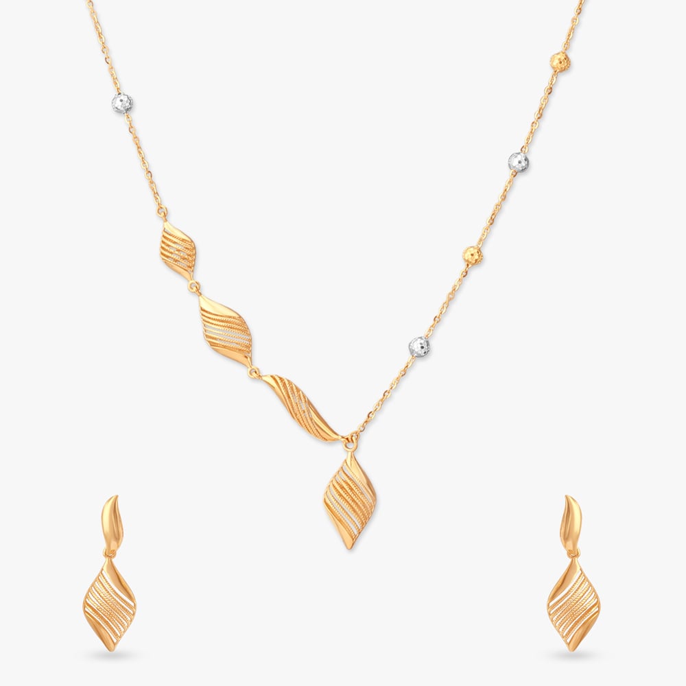 

Fluid Rhythm Gold Necklace Set