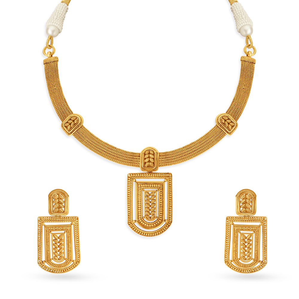 

Surreal Geometric Gold Necklace Set