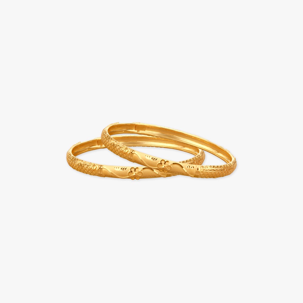 

Flora Crest Gold Bangles