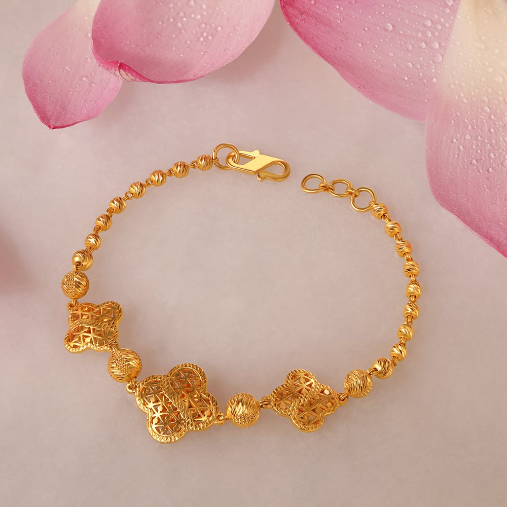 Gold Designer Bracelet from Tanishq  South India Jewels