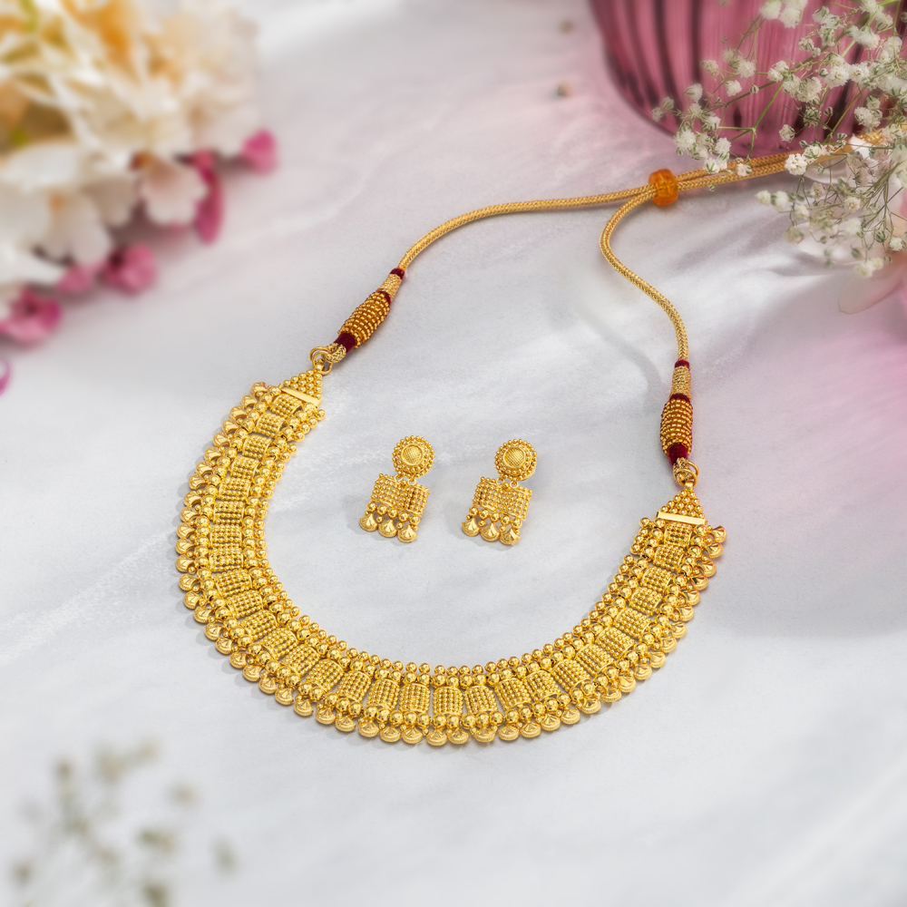 Gold necklaces tanishq on sale