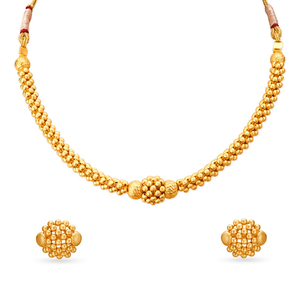 

Striking Yellow Gold Beaded Necklace and Earrings Set