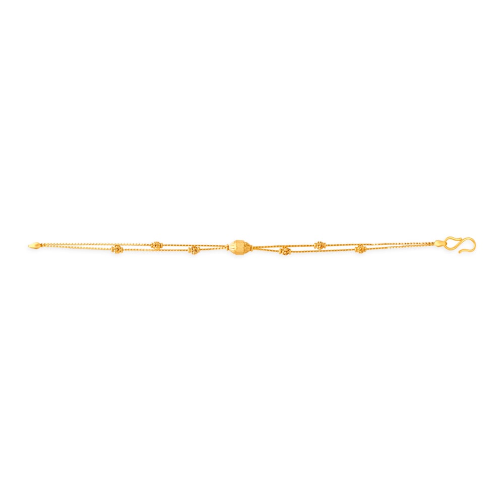 

Delicate Yellow Gold Carved Bead Bracelet