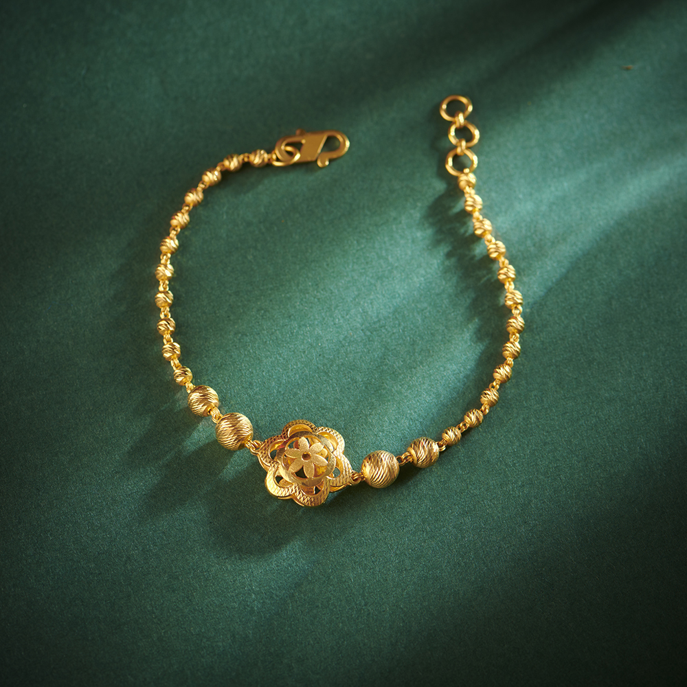 Abharan Teardrop Cut Pink Stones Gold Plated Bracelet – VOYLLA