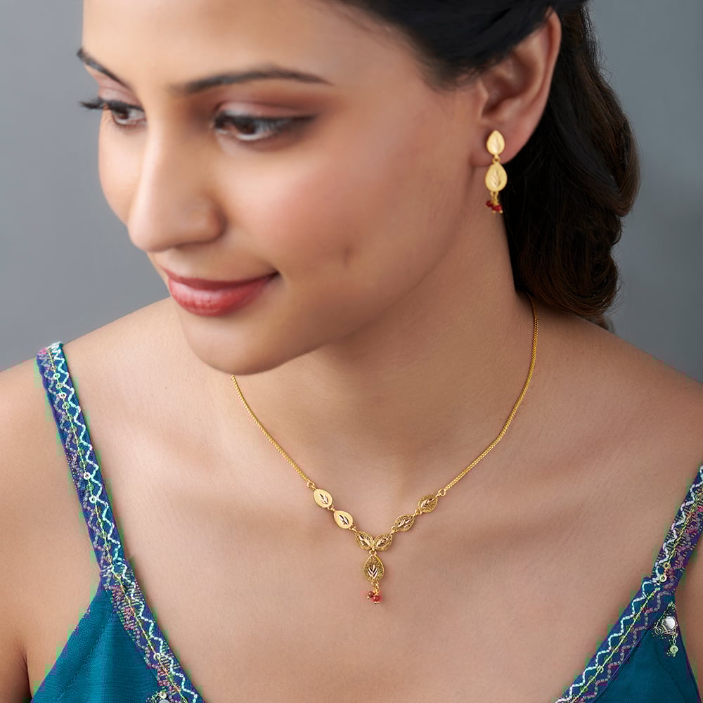 Dainty jewellery tanishq discount