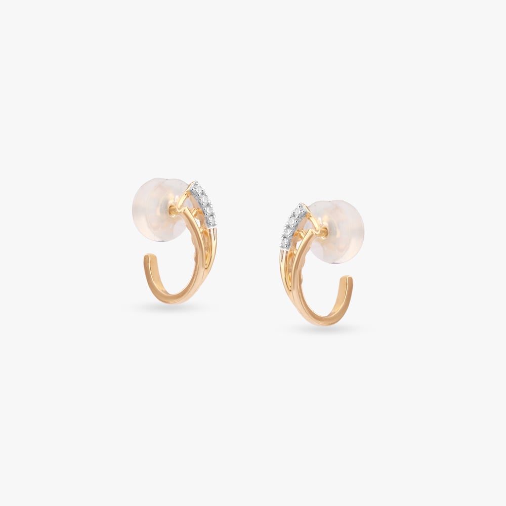 

Linear Rise Diamond Stud Earrings