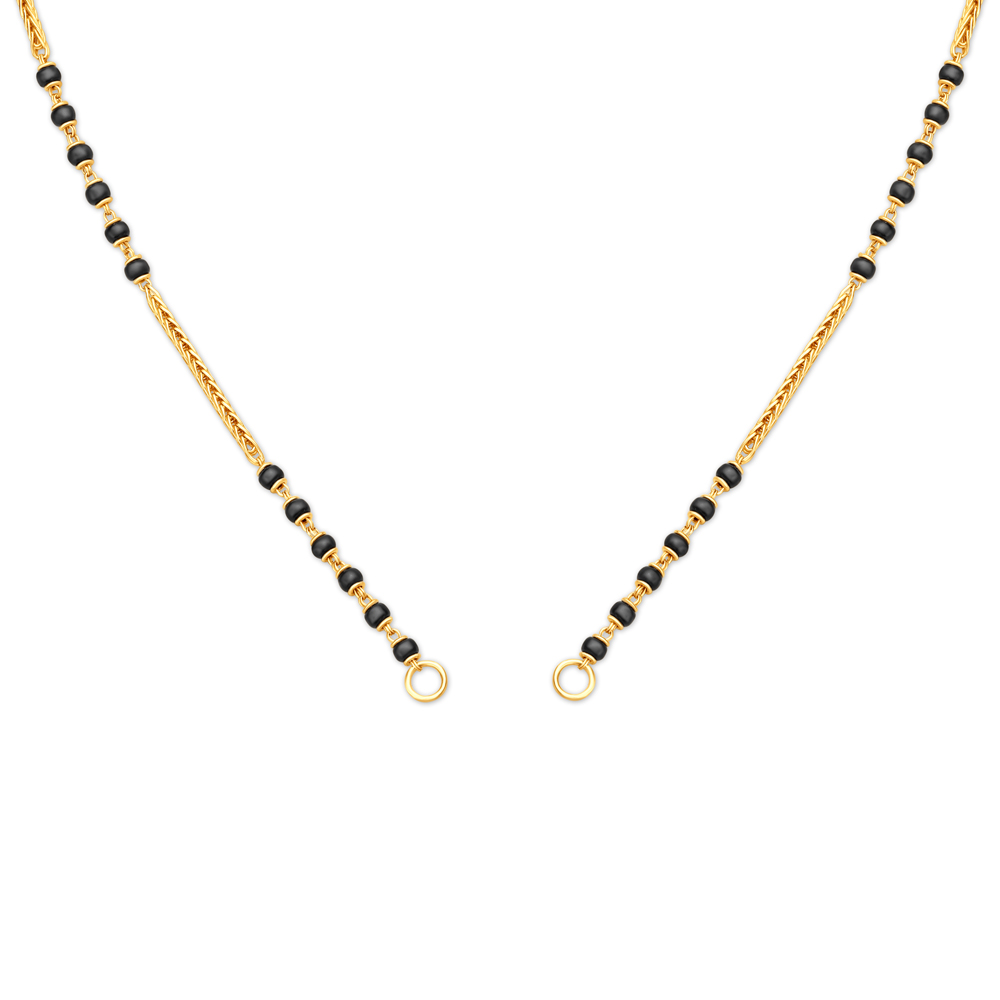 Gold mangalsutra by tanishq sales