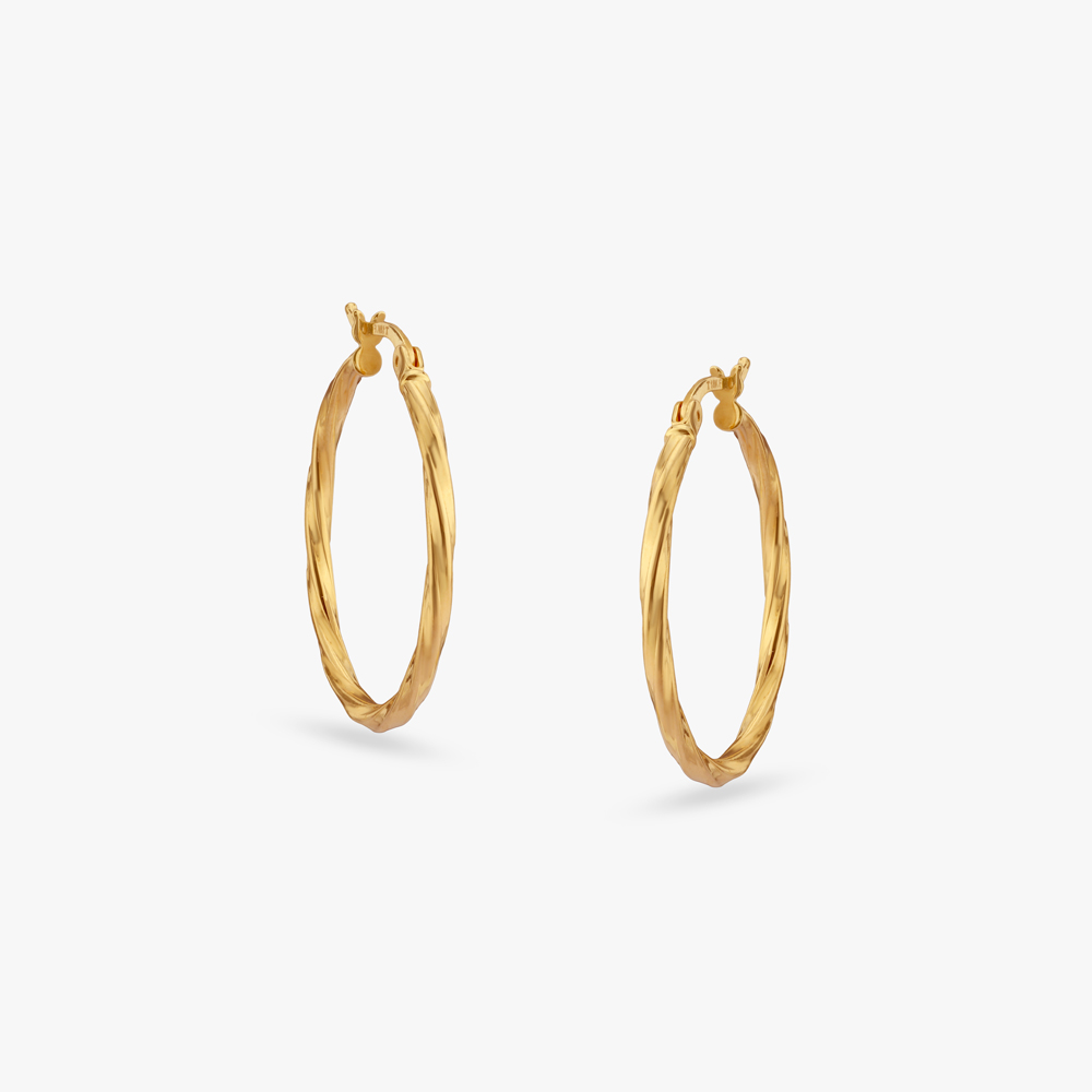 

Twisted Glow Gold Hoop Earrings