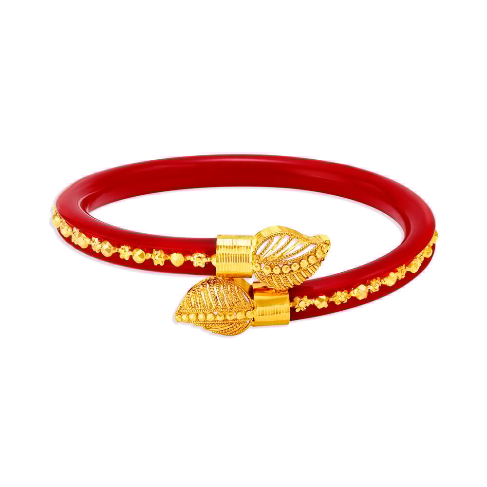 

Radiant Leaf Motif Gold Pola Bangle