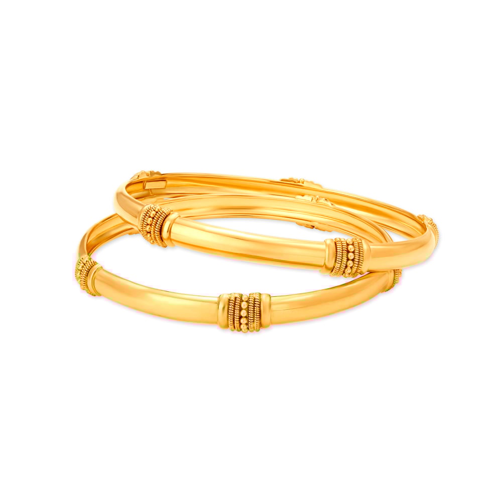 

Impressive 22 Karat Yellow Gold Pillar Bangle