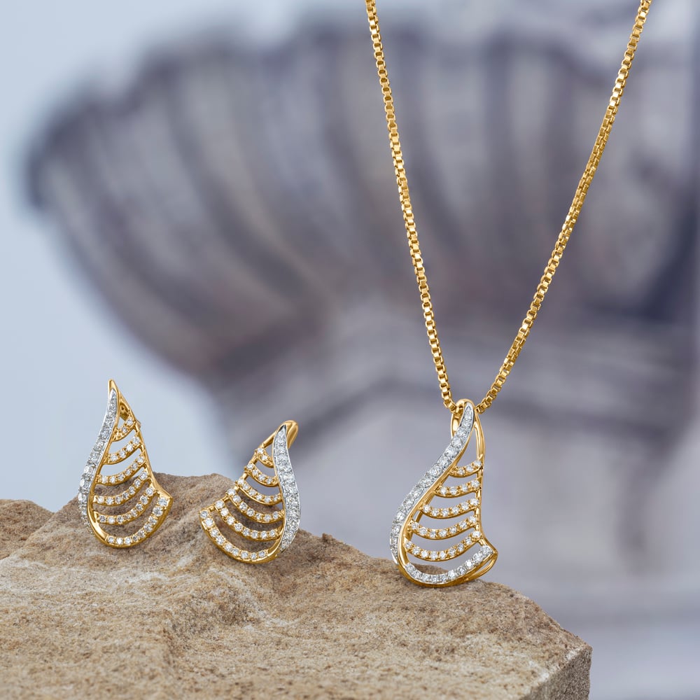 

Serene Motion Diamond Pendant and Earrings Set