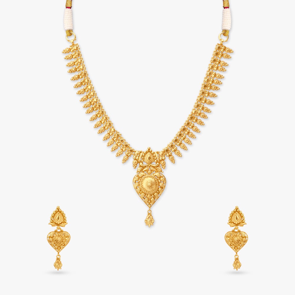

Heirloom Heartbeat Gold Necklace Set