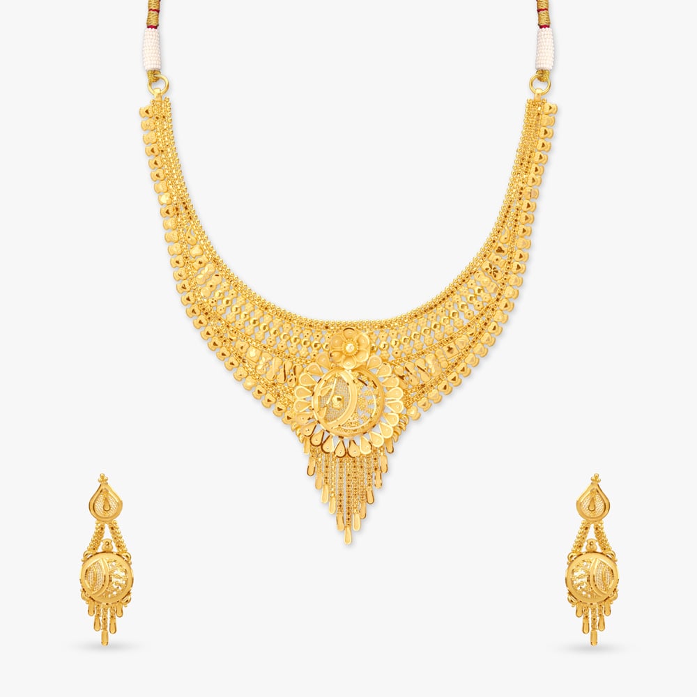 

Petal Cascade Gold Necklace Set