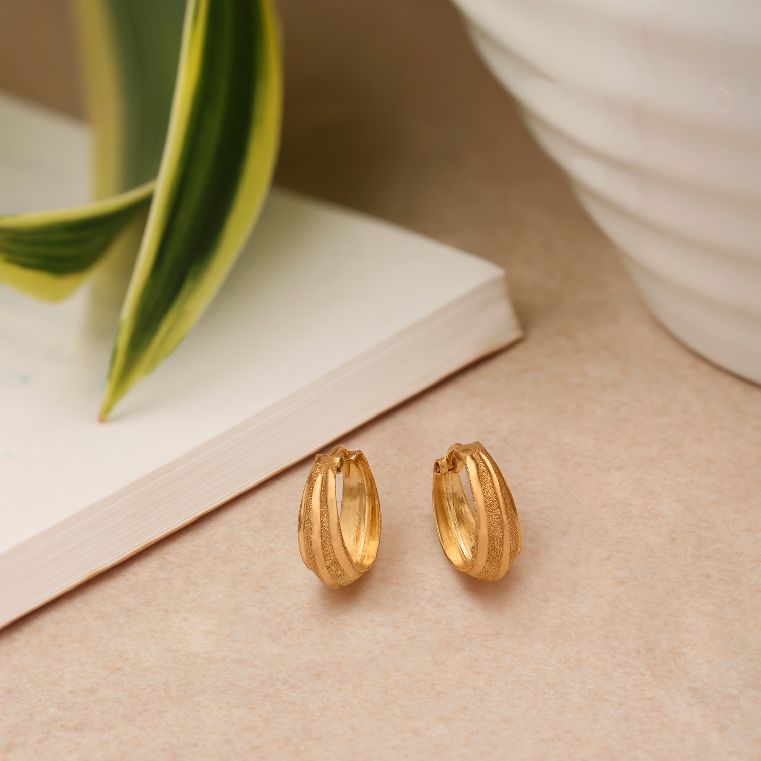 

Traditional Shimmering Gold Hoop Earrings