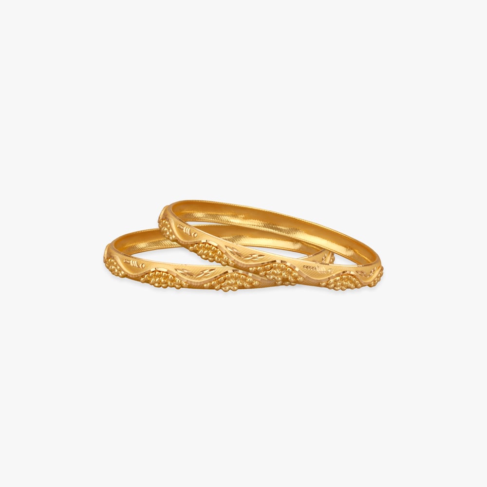 

Woven Glow Gold Bangles