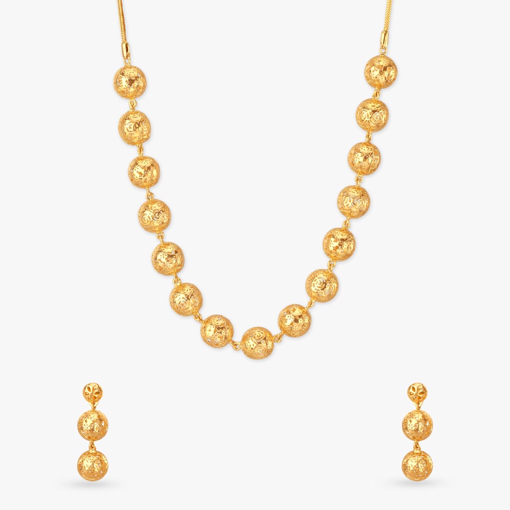 

Beaded Bloom Gold Necklace Set