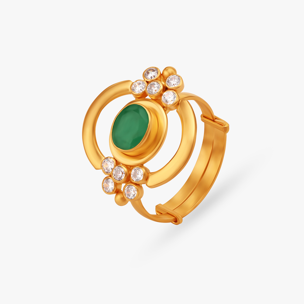 Elegant Floral Ring with Emeralds